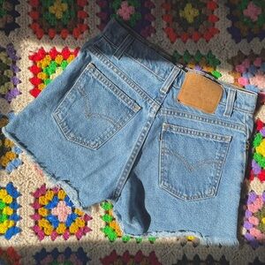 Vintage 1980s white tab 910 Levi’s cutoff shorts. USA made